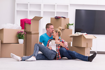 Image showing young couple moving  in new house