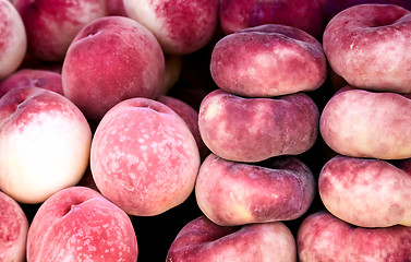 Image showing Tasty fruits - ripe peaches.