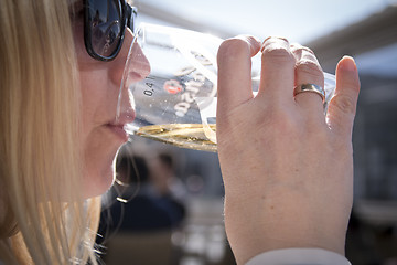 Image showing Female Beer Drinker