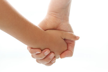 Image showing Mother holding a baby's hand.