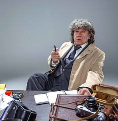 Image showing The senior man as detective or boss of mafia on gray studio background