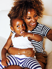 Image showing adorable sweet young afro-american mother with cute little daugh