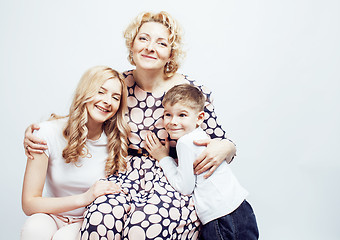 Image showing happy smiling family together posing cheerful on white background, lifestyle people concept, mother with son and teenage daughter isolated