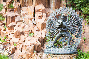 Image showing Tantric Deities statue in Ritual Embrace located in a mountain g