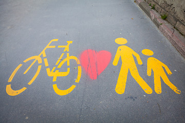 Image showing Bicycle signs painted on asphalt