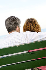 Image showing Mature romantic couple on a bench