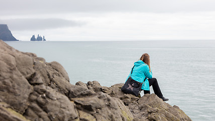 Image showing Young woman enjoying the Icelandic landscape