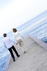 Image showing Mature romantic couple on a pier