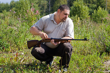 Image showing cleaning of rifles