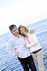 Image showing Mature romantic couple at seashore