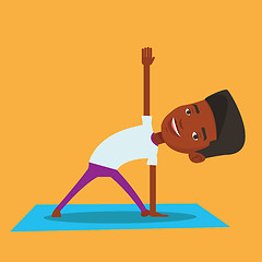 Image showing Man practicing yoga triangle pose.