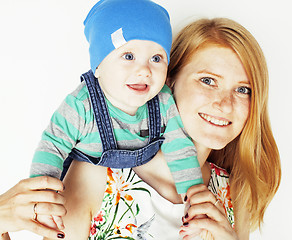 Image showing young beauty mother with cute baby, red head happy modern family