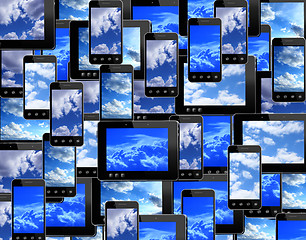 Image showing smart-phones and tablets with image of blue sky