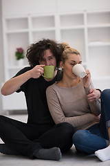 Image showing young couple in their new home