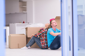 Image showing young couple moving  in new house