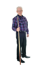 Image showing Senior standing with billiard cue.