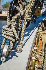 Image showing Rigging on the old sailboat against the background of modern yac