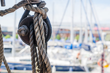 Image showing Rigging on the old sailboat against the background of modern yac