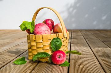 Image showing Basket with ripe red apples, close-up