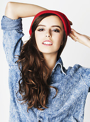 Image showing young cheerful brunette teenage girl on white background