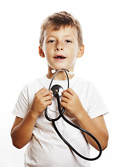 Image showing little cute boy with stethoscope playing like adult profession d