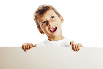 Image showing little cute boy holding empty shit to copyspace isolated close u