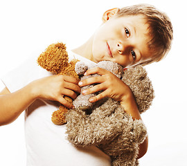 Image showing little cute boy with many teddy bears hugging isolated close up