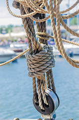 Image showing Rigging on the old sailboat against the background of modern yac