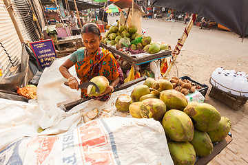 Image showing Coconut milk seller