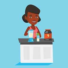 Image showing Young woman making protein cocktail.