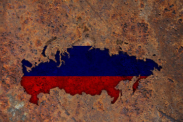 Image showing Map and flag of Russia on rusty metal