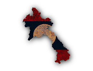 Image showing Map and flag of Laos on rusty metal