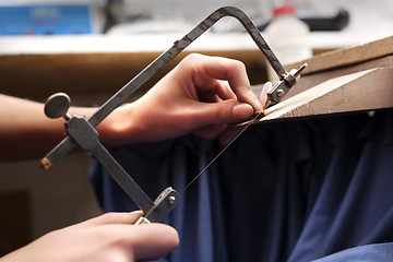 Image showing Occupation jeweler. Creating jewelry. Manually creating jewelry.