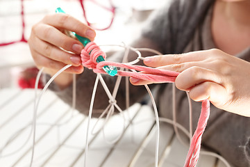 Image showing Crocheting. Hand needlework. Needlework.