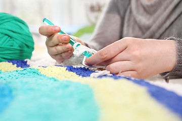 Image showing Crocheting. Hand needlework.