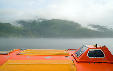 Image showing Orange Lifeboat Inside Passage Sea Ocean Liner Cruise