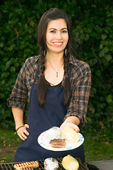 Image showing Pretty Woman Smiling Cooking Steaks Barbecue Backyard Food Grill