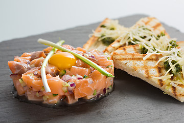 Image showing fish tartare with quail egg 