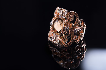 Image showing Gold ring with white diamonds