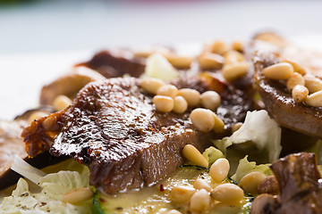 Image showing salad with meat. grilled beef tongue