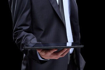 Image showing business man with tablet.