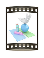 Image showing 3d man on a karemat with fitness ball. 3D illustration. The film