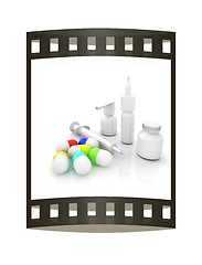 Image showing Syringe, tablet, pill jar. 3D illustration. The film strip