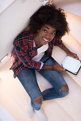 Image showing black woman using her electronic tablet