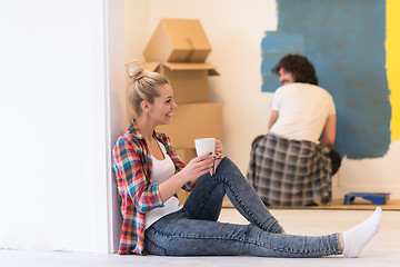 Image showing young couple doing home renovations