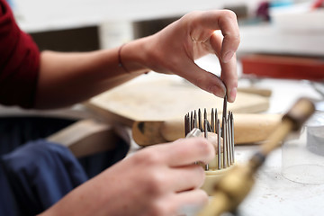 Image showing Skewer binding gemstones.