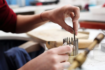 Image showing Skewer binding gemstones.