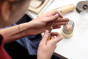 Image showing Skewer binding gemstones.