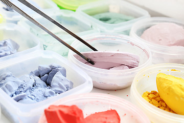 Image showing Coloured pigments painting ceramic pigments