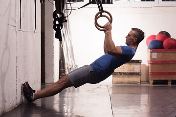 Image showing man doing dipping exercise